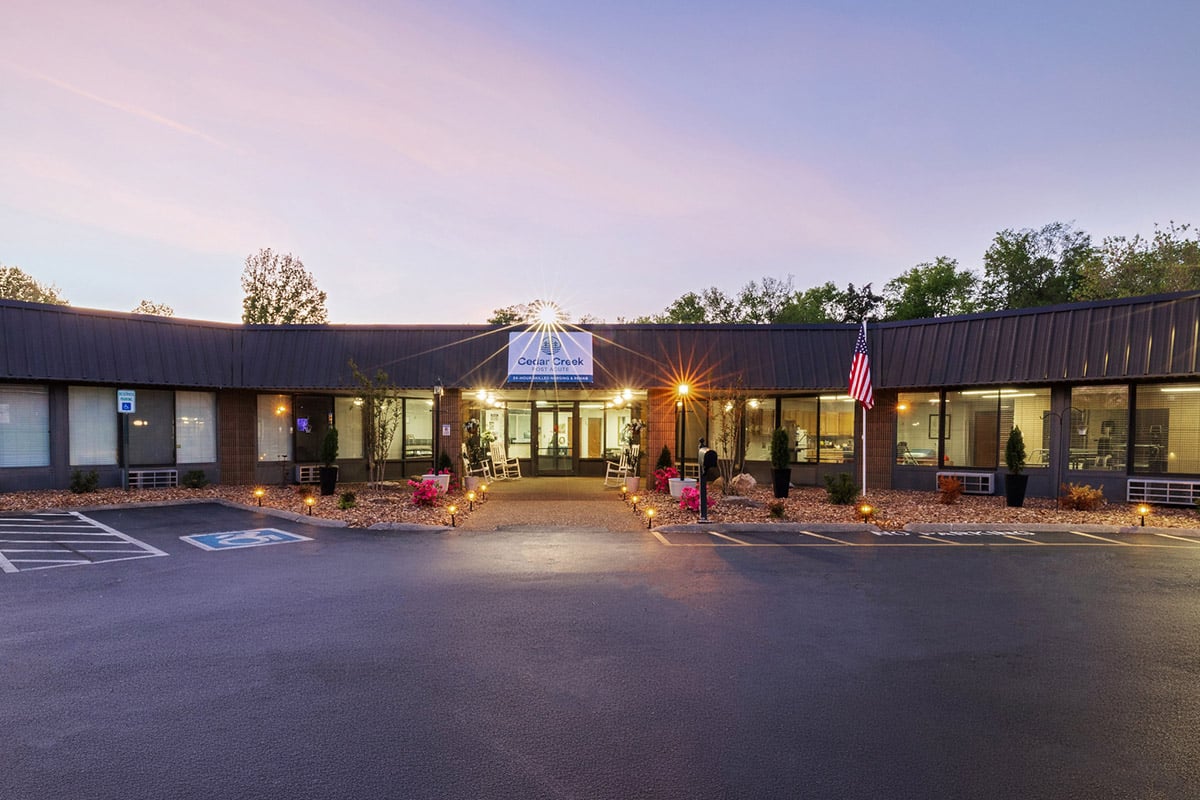 Outdoor front dusk view at Cedar Creek Post Acute
